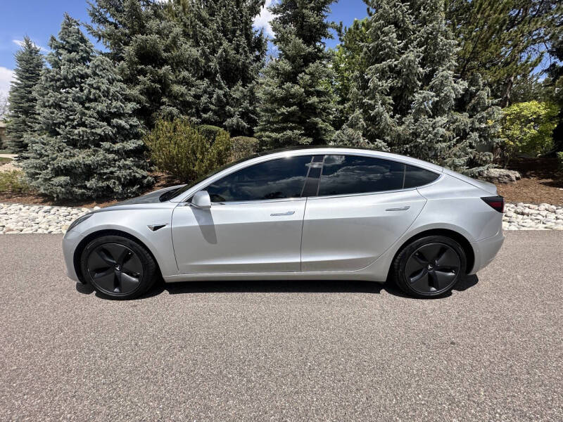 tesla model 3 2018 5YJ3E1EB9JF065317 image tesla model 3 2018 5YJ3E1EB9JF065317 image